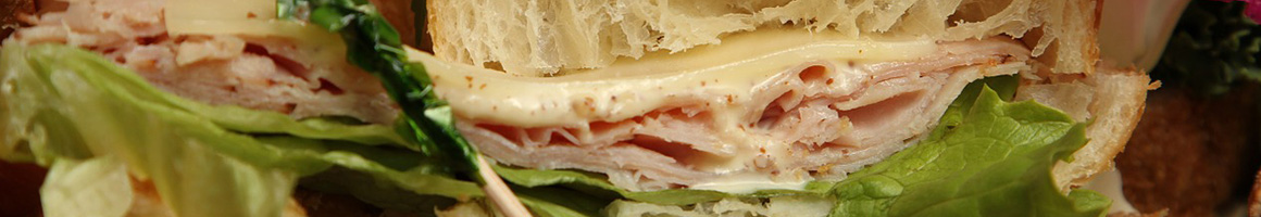 Eating Deli Sandwich at Esposto's Delicatezza restaurant in San Francisco, CA.